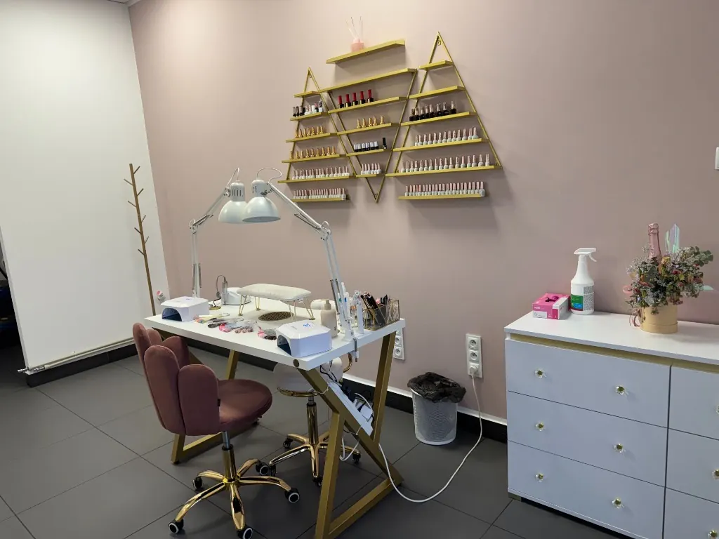 Luxurious nail salon interior with elegant pink and white design